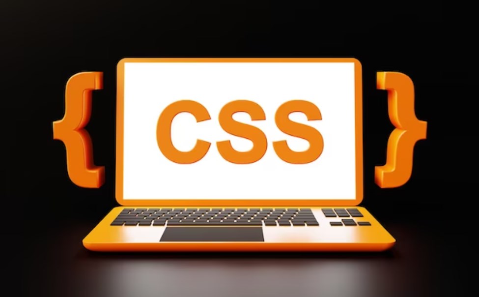 website development 3D concept: an orange 3D laptop with the “CSS” abbreviation on the screen
